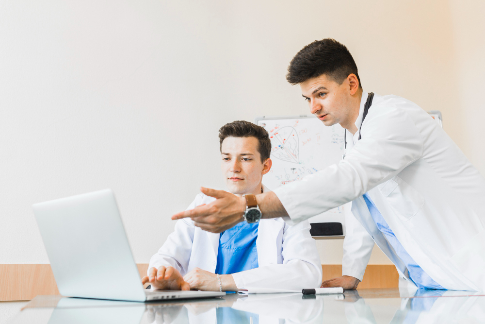 doctors with laptop